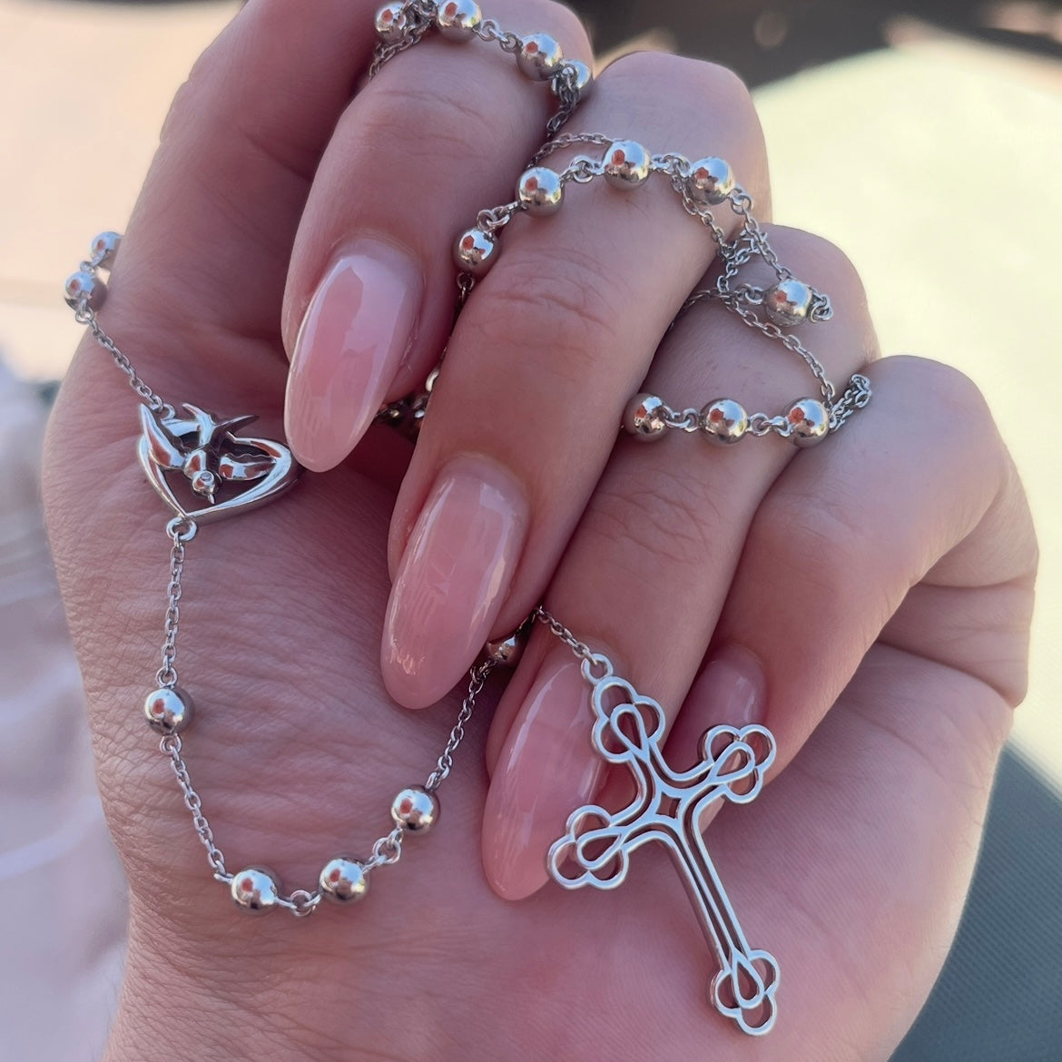 Our Madeleine rosary necklace in sterling silver