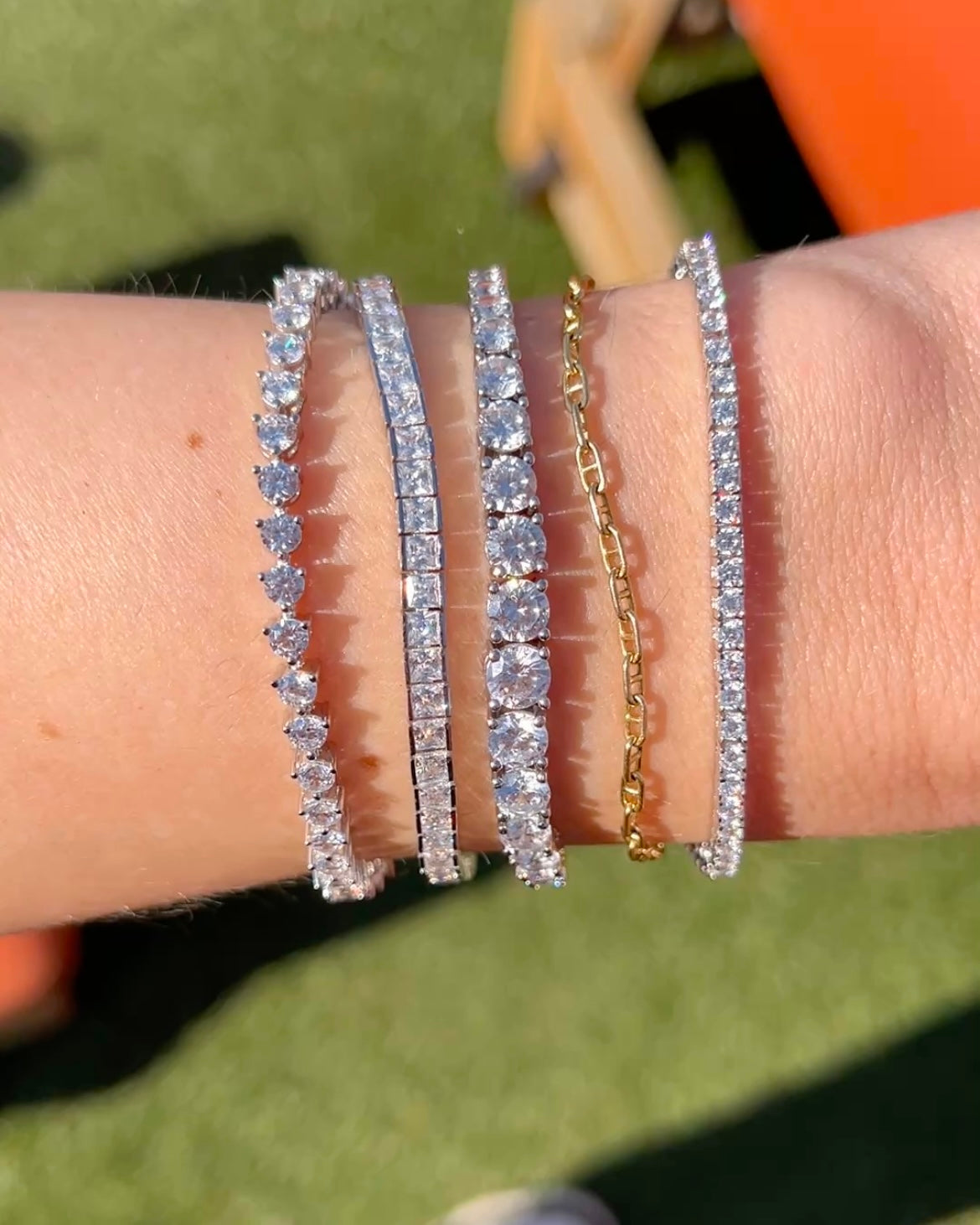 Our faux tennis bracelets with our 3mm tennis bracelet, our princess cut tennis bracelet, our graduated tennis bracelet, and our thin tennis bracelet