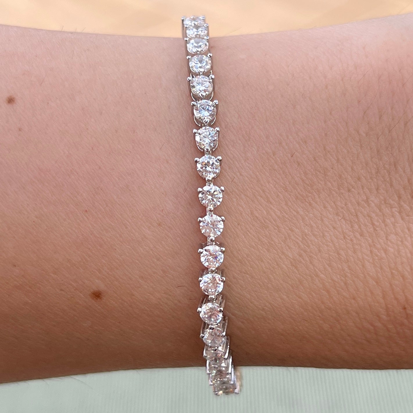 Our 3 prong 3mm tennis bracelet shown on wrist 