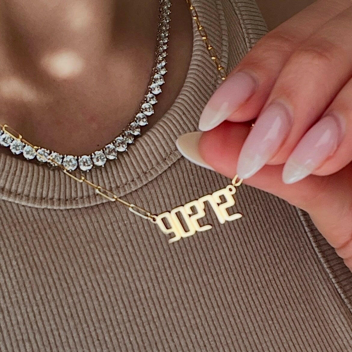 90272 necklace with a graduated tennis necklace