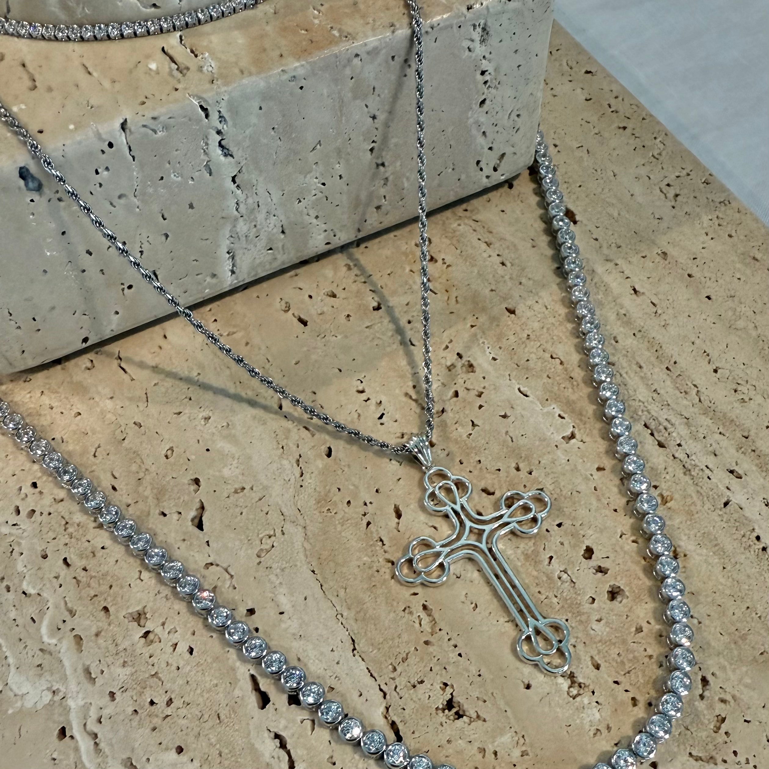Silver cross pendant with tennis necklaces