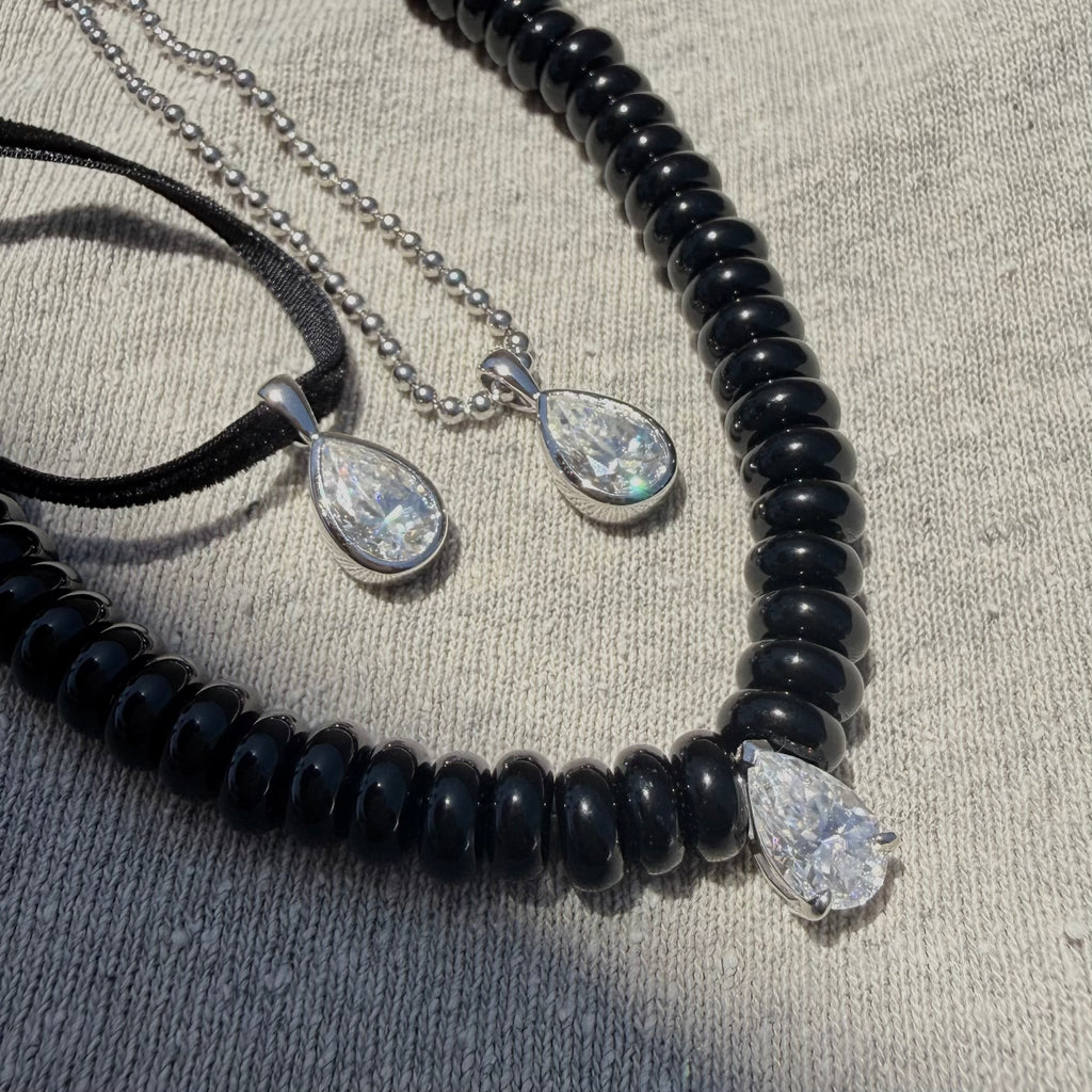 Black agate and moissanite drop necklace with two moissanite pear shaped pendants 