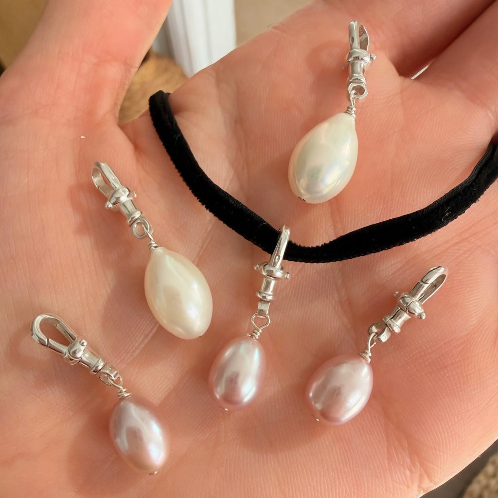 Five freshwater ivory and pink pearl drop charms with sterling silver vintage-inspired watch clasps