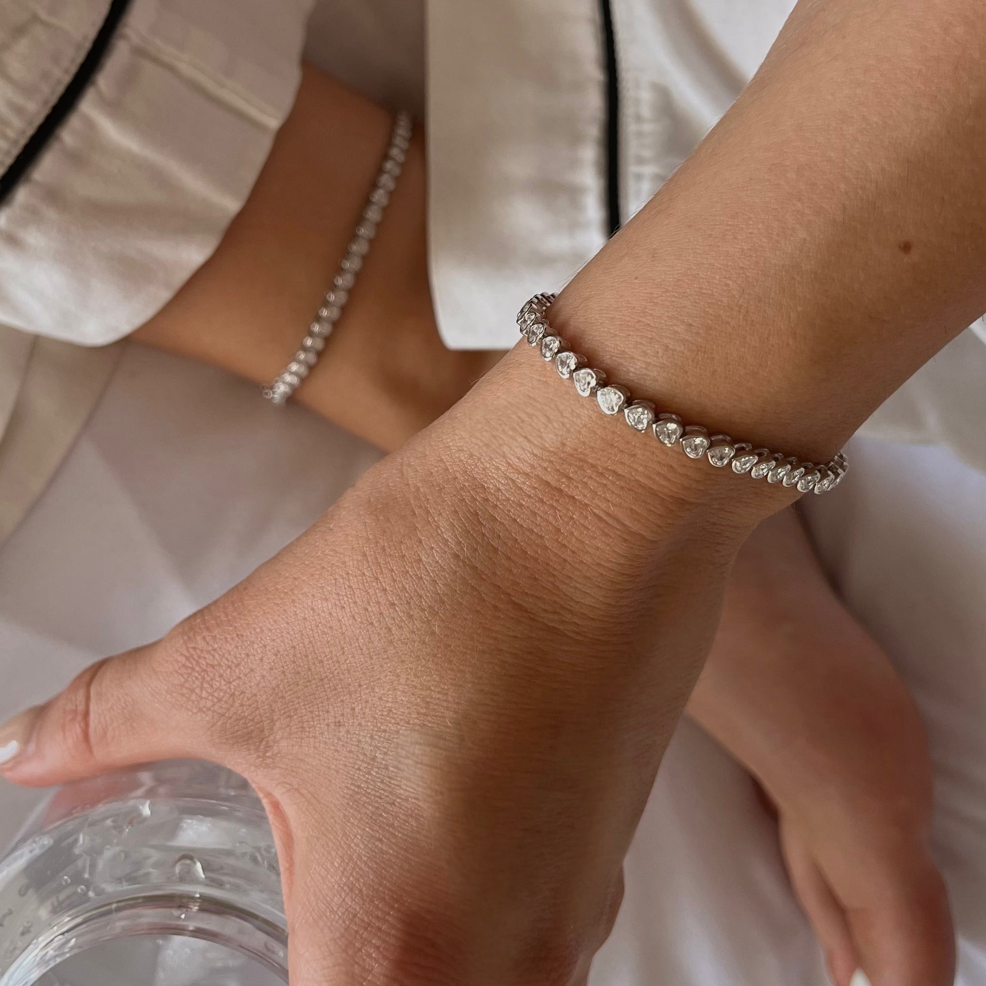 Our Marie tennis set with our heart bezel tennis anklet and bracelet 