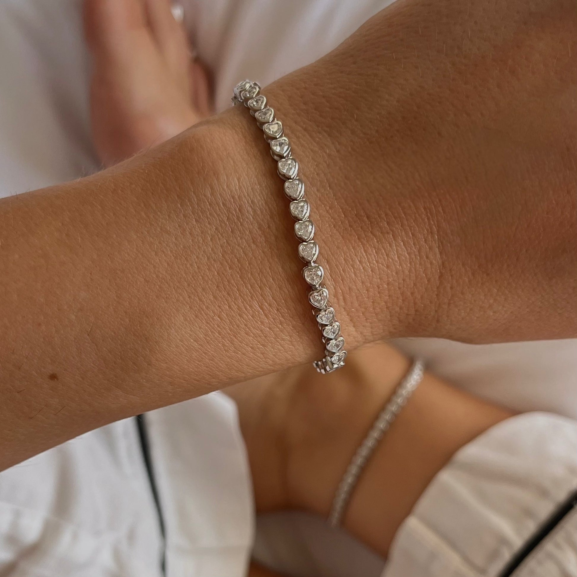 Our matching heart bezel tennis set with tennis anklet and bracelet 