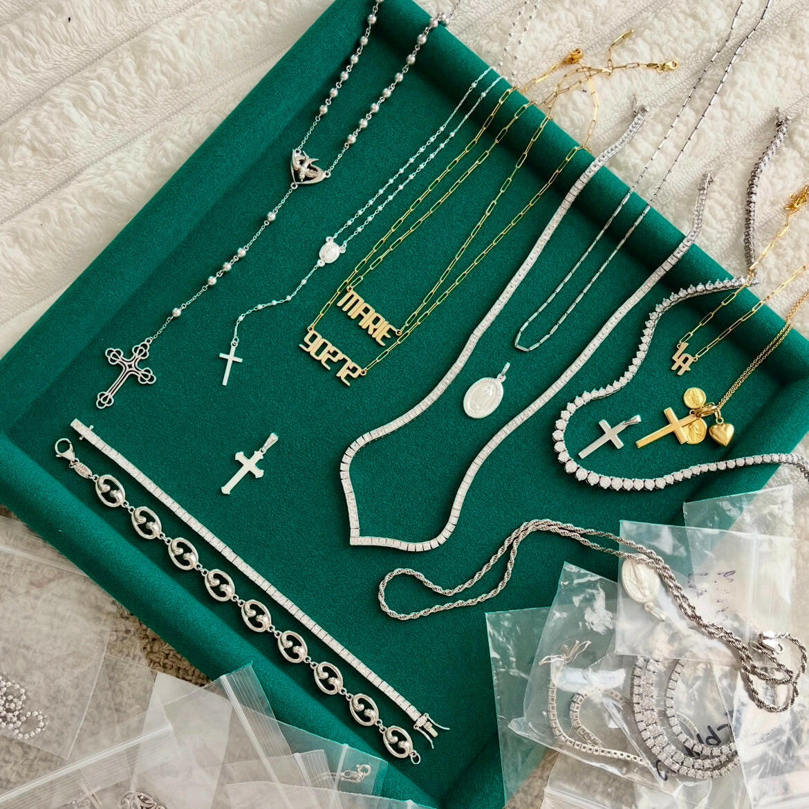 Leni James jewelry pieces on a jewelry tray