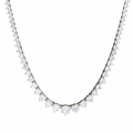 Graduated diamond necklace on a white background