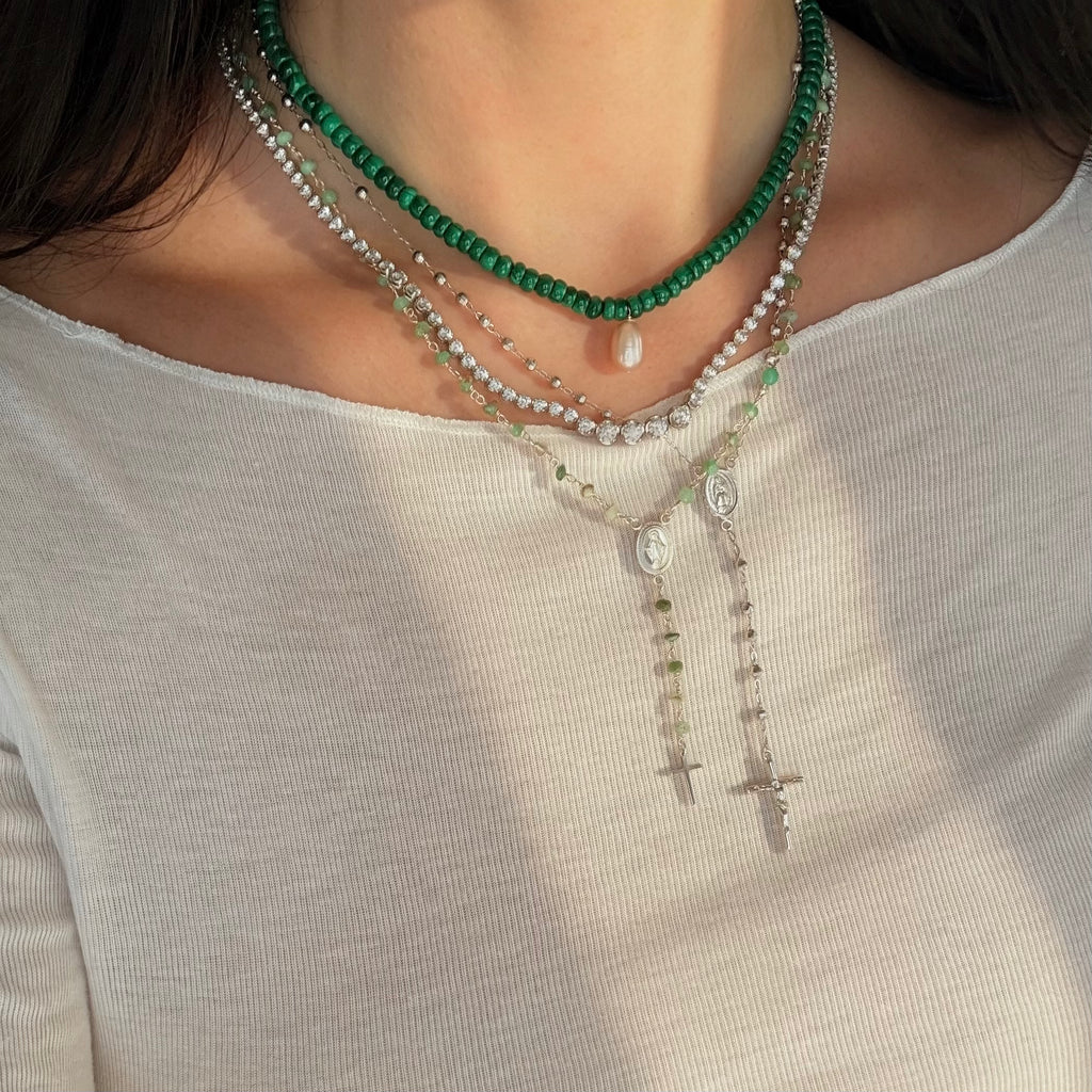 Malachite beads with a tennis necklace layered with sterling silver and green rosaries