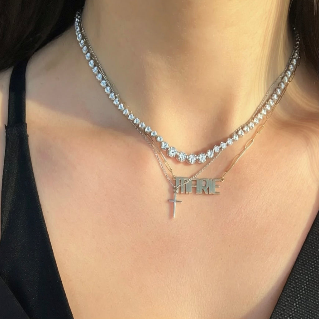 Graduated tennis necklace with mini cross and nameplate necklace 