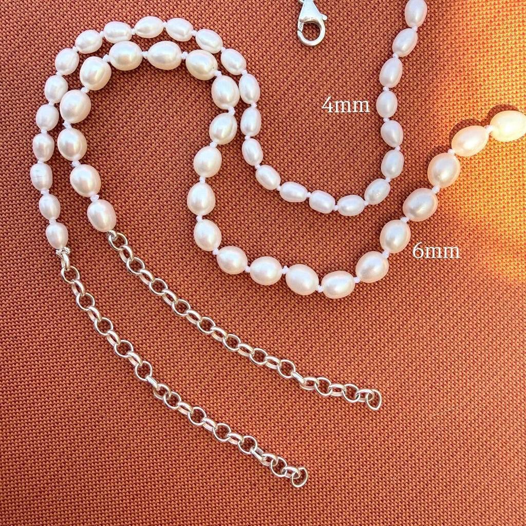 Pearl necklaces with silver extension chain