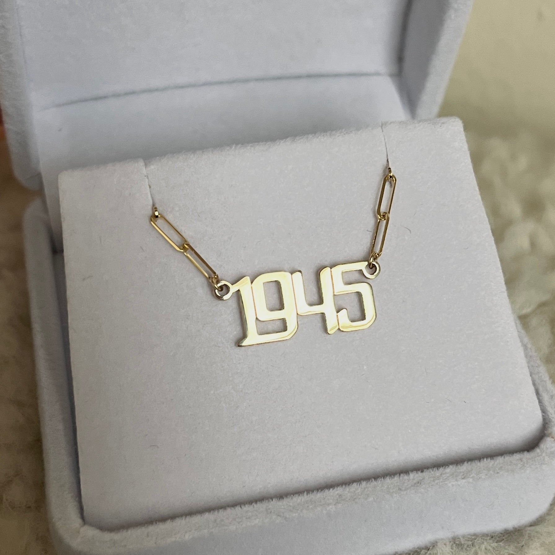 Gold nameplate necklace with date 