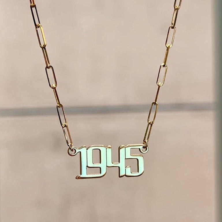 Gold custom nameplate necklace with year 1945