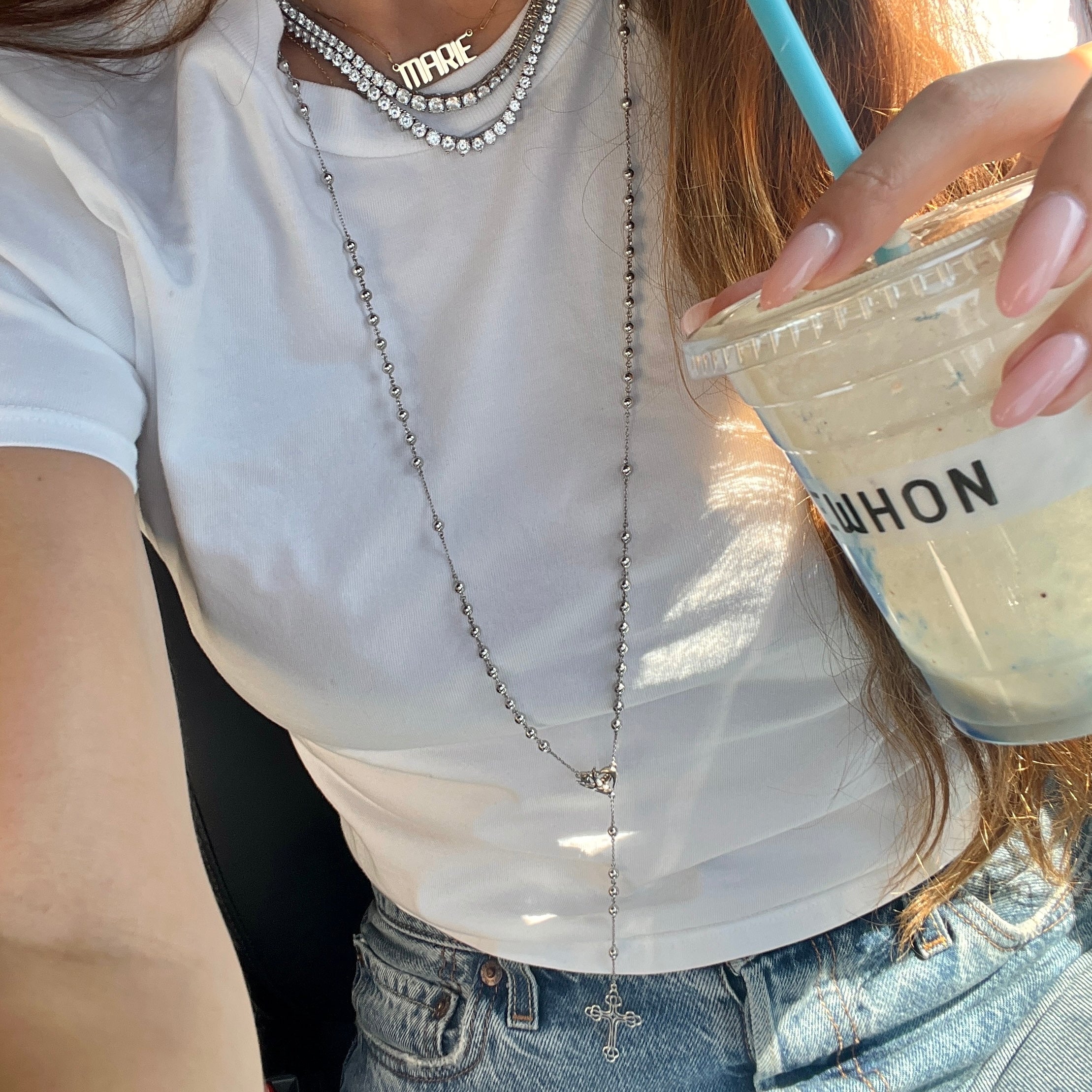 Our Madeleine rosary necklace in silver with tennis necklaces and gold nameplate necklace